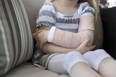 Child With Cast After Medical Negligence