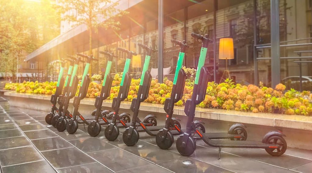 e-scooters parked on the sidewalk in Melbourne, VIC