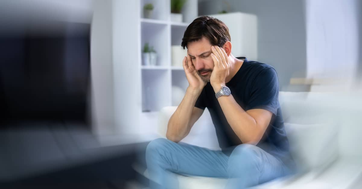 Man suffering from post-concussion syndrome | Henry Carus + Associates