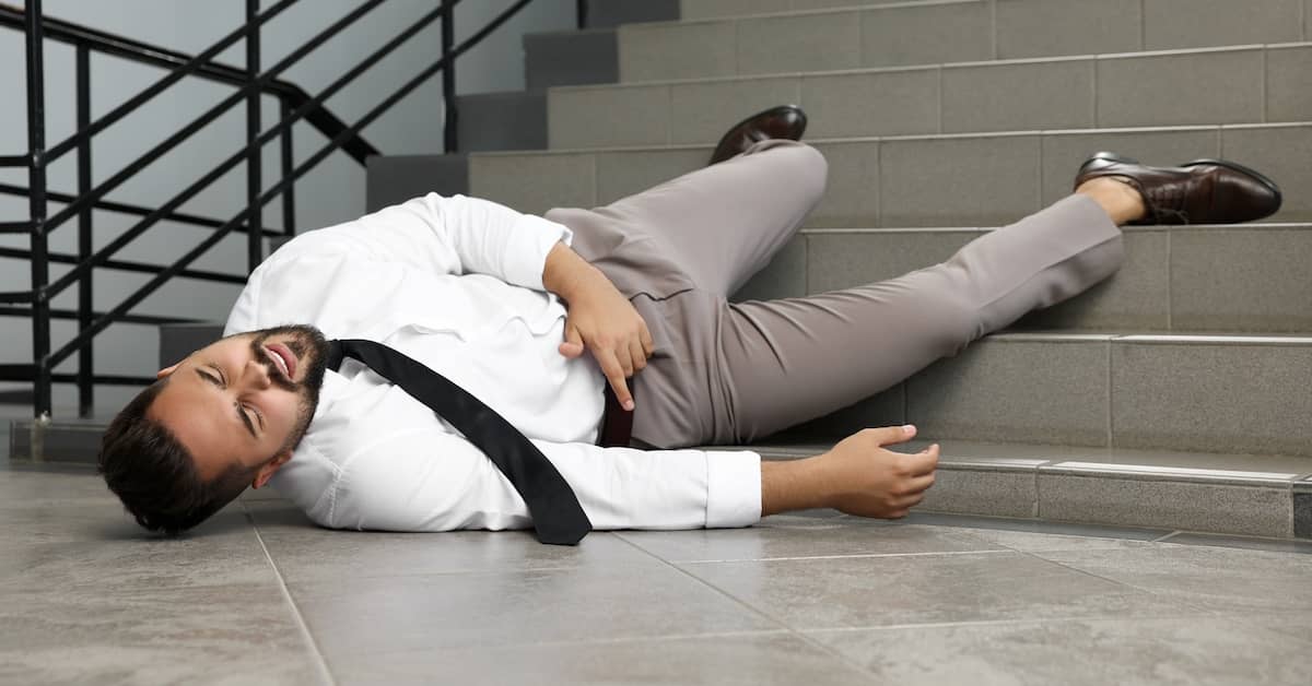 Businessman injured in slip and fall on stairs | Henry Carus + Associates